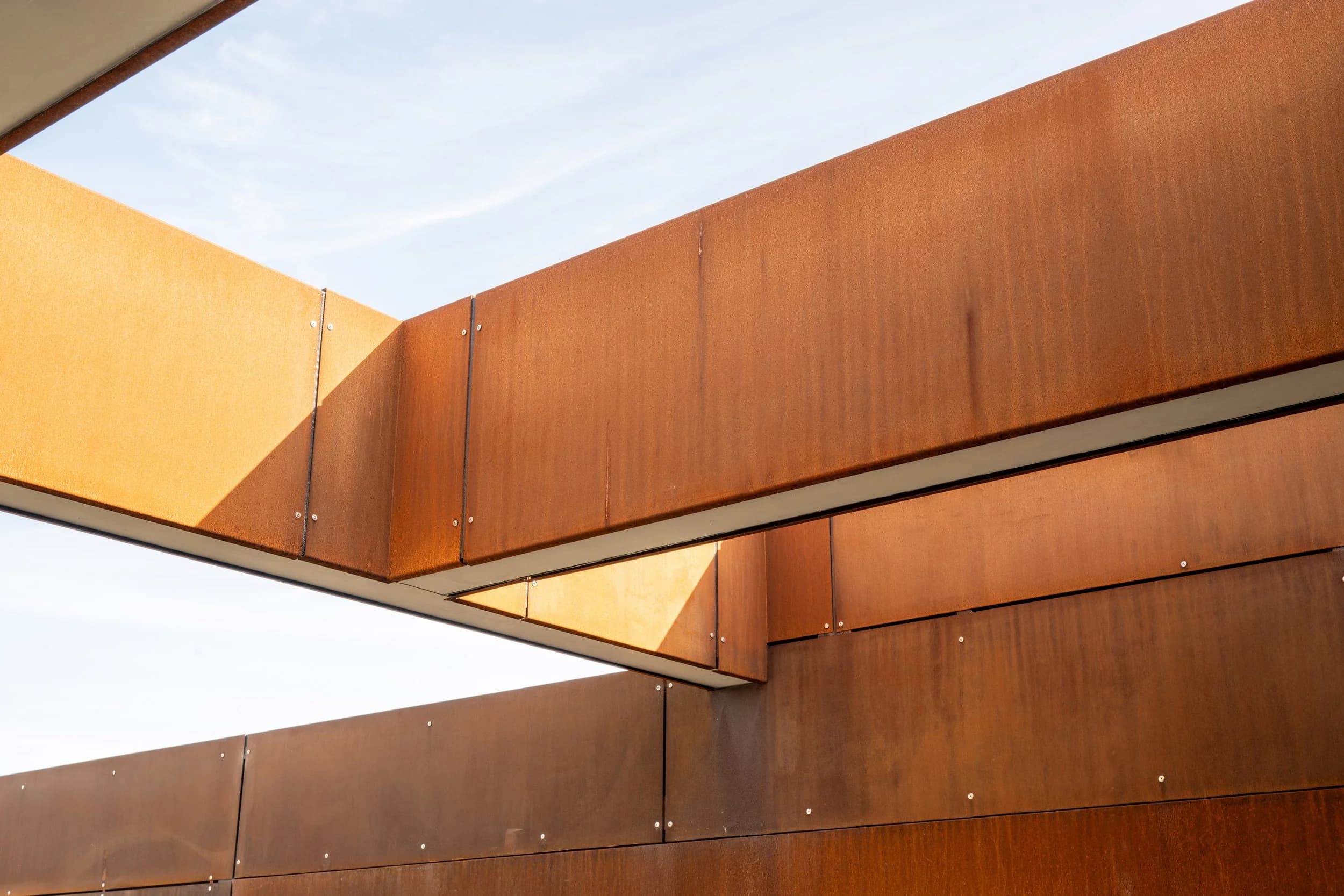 A house designed by Archco, photographed at dusk